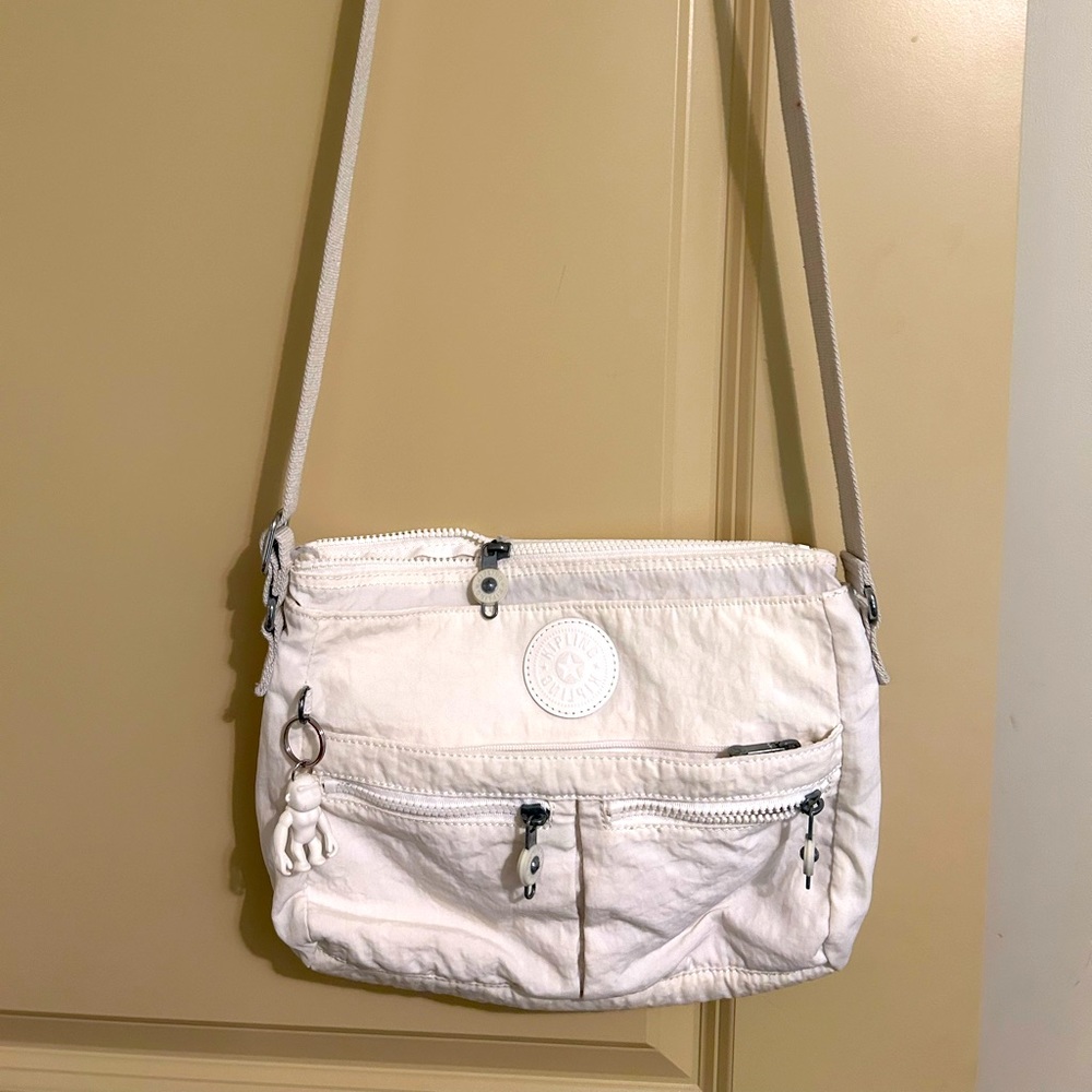 Kipling white crossbody bag .
